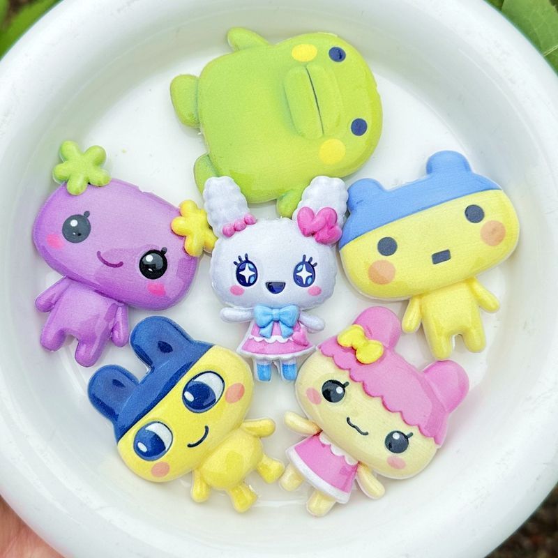 45mm Cartoon Tamagotchi double - Phone Accessories Beads recension och pris